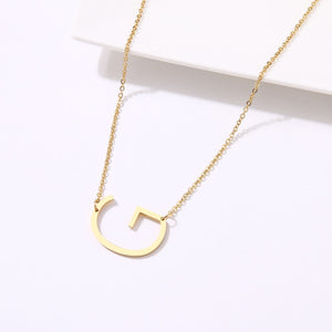 slanted initial necklace gold / g