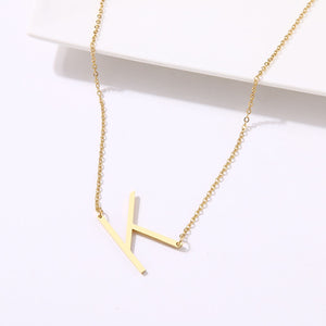 slanted initial necklace gold / k