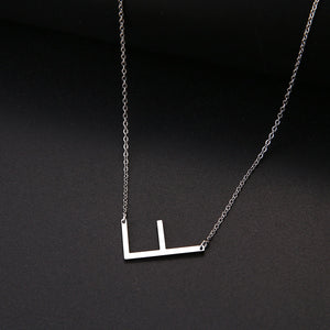slanted initial necklace silver / f