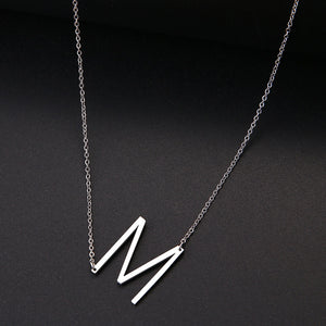 slanted initial necklace silver / m