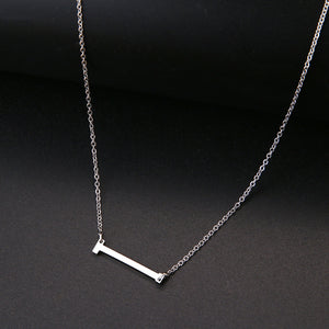slanted initial necklace silver / i