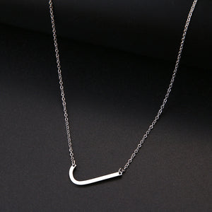 slanted initial necklace silver / j