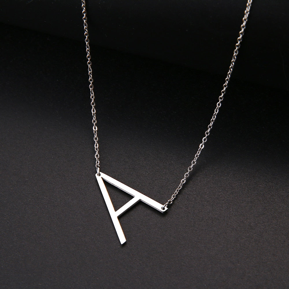 slanted initial necklace silver / a