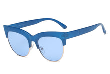 Load image into Gallery viewer, a pair of blue scissors sitting on top of a white surface 
